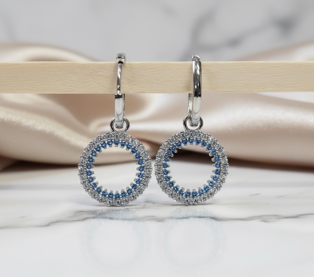 Blue Crystal Hoop Earrings with Elegant Background